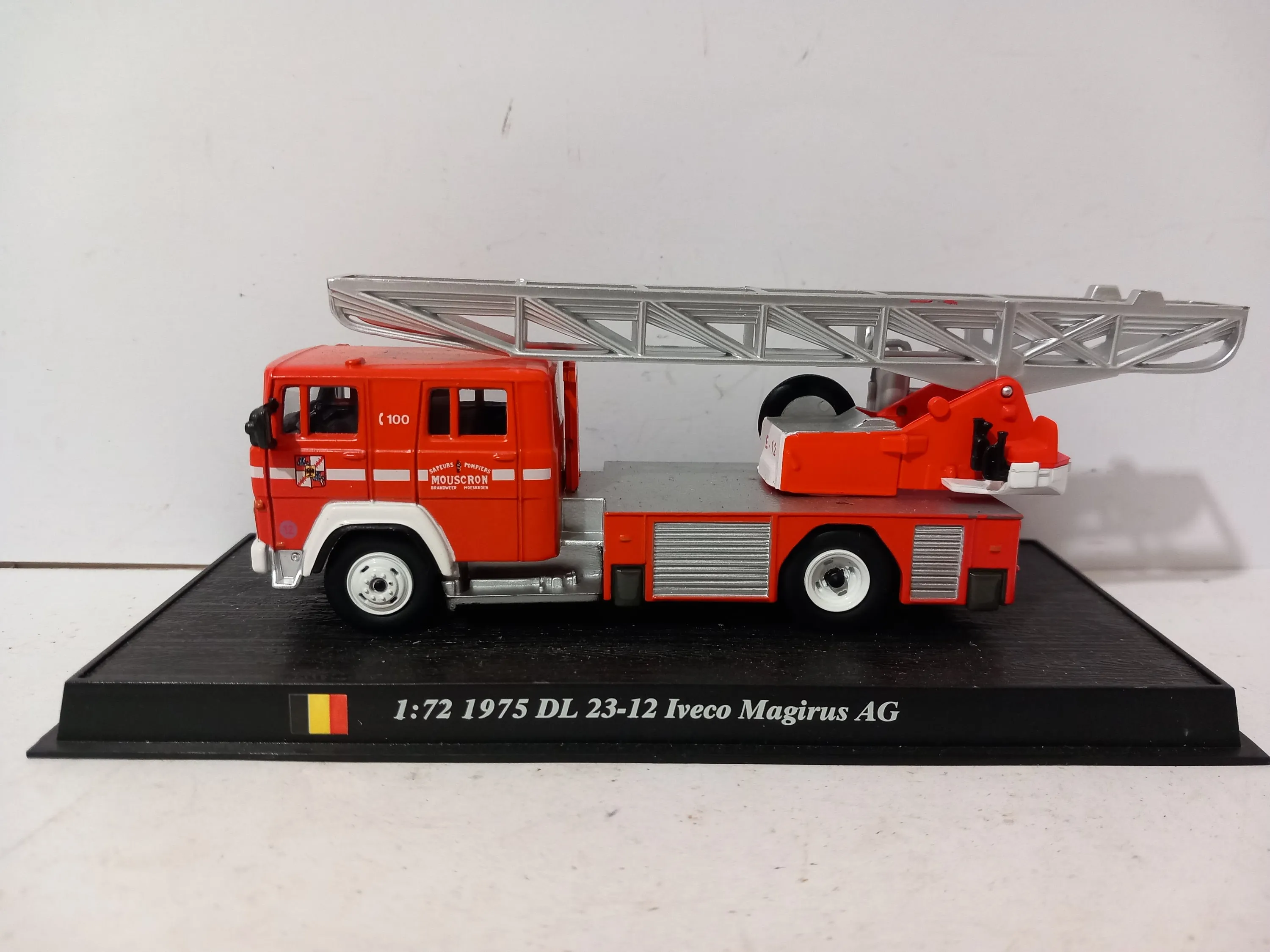49677 applying base coat on fire engine