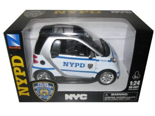 /img/49679-diecast-smart-car-toy-kid-playing.webp